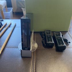 Nintendo Wii and Assortment of Video Games