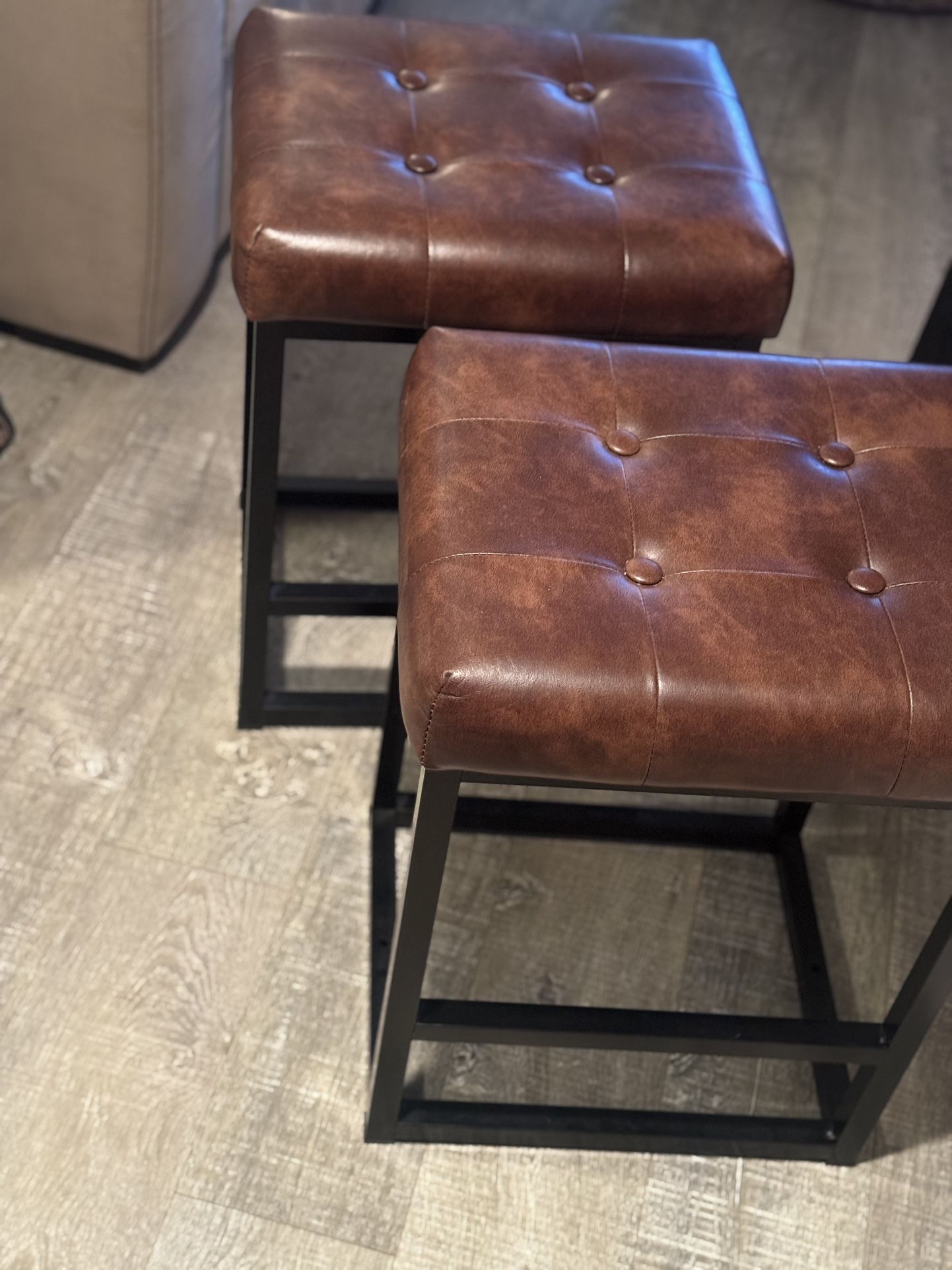Two Faux Leather Stools