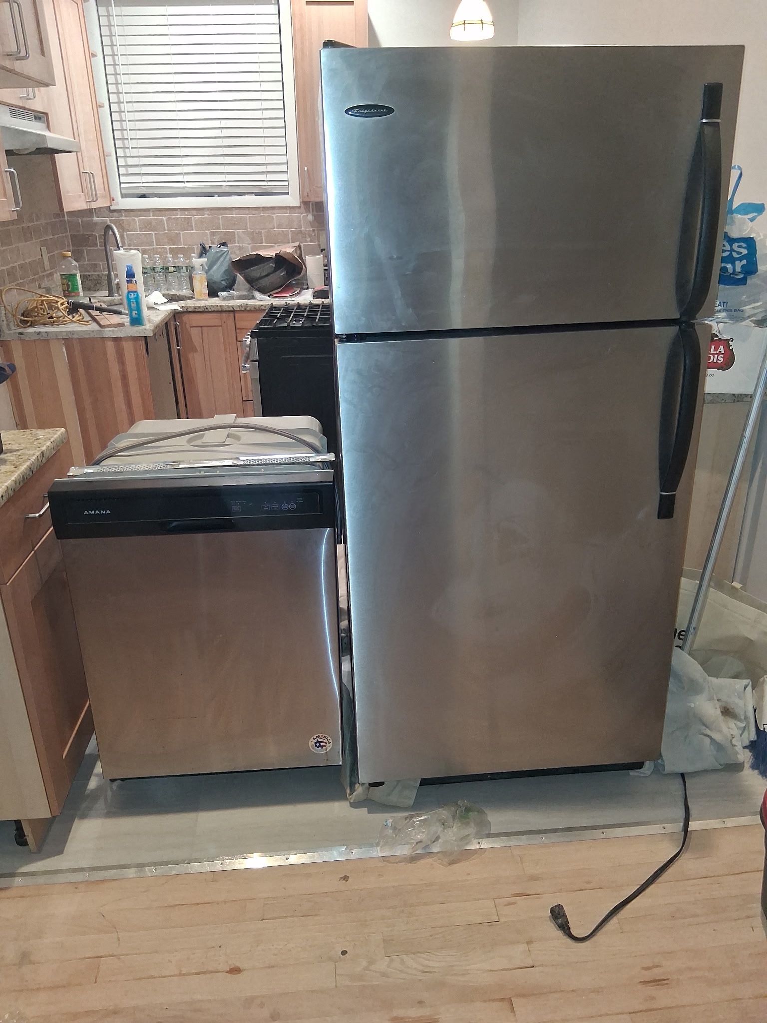 3 Kitchen Appliances: Refrigerator, Stove, Dishwasher