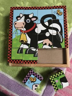 Wooden Melissa and Doug block puzzle -6 games.