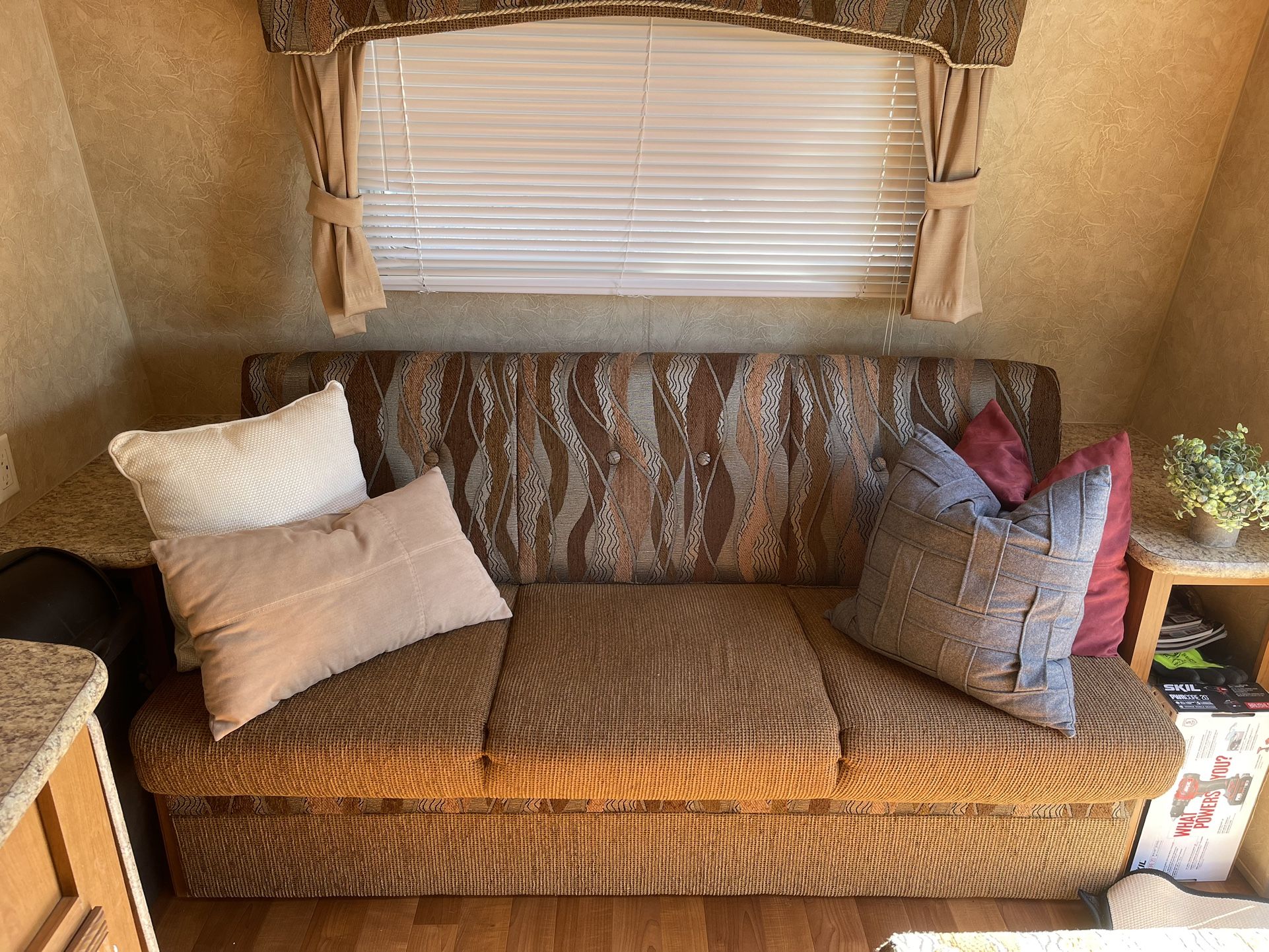 Travel Trailer Sofa/bed, End Tables, and Table With Bench Seating/storage.