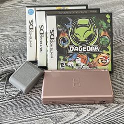 Nintendo DS with 3 games in excellent condition, complete with matching stylus & new charger. $65