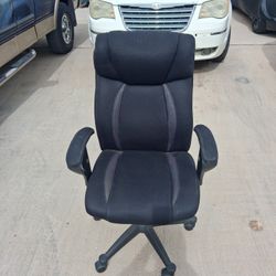Black micro fiber , adjustable office chair.