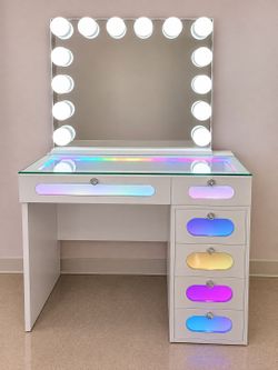 LED Vanity Table with Bluetooth Mirror Upgrade your beauty space with this stunning vanity featuring colorful LED lights on the tabletop and drawers,