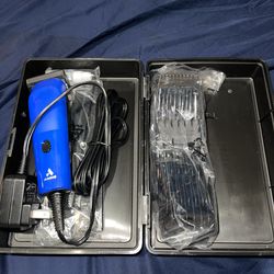 Andis inCLINE 20-Piece Clipper Kit (Model 560155).