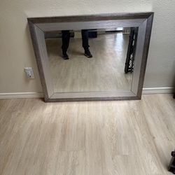 Grey hanging mirror