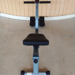 Seated back rowing exercise machine. Multiple levels of resistance, comes with built in clock, timer and counter.