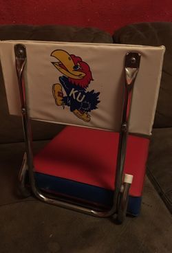 Vintage KU hard back folding seat .