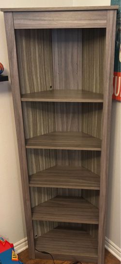 Corner book shelf with custom lighting