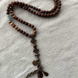 20 Inch Chan Luu Wood Beads With 3 Pale Blue Faceted Beads. Also Dangling Discs, Chain And Decorative Bar. 