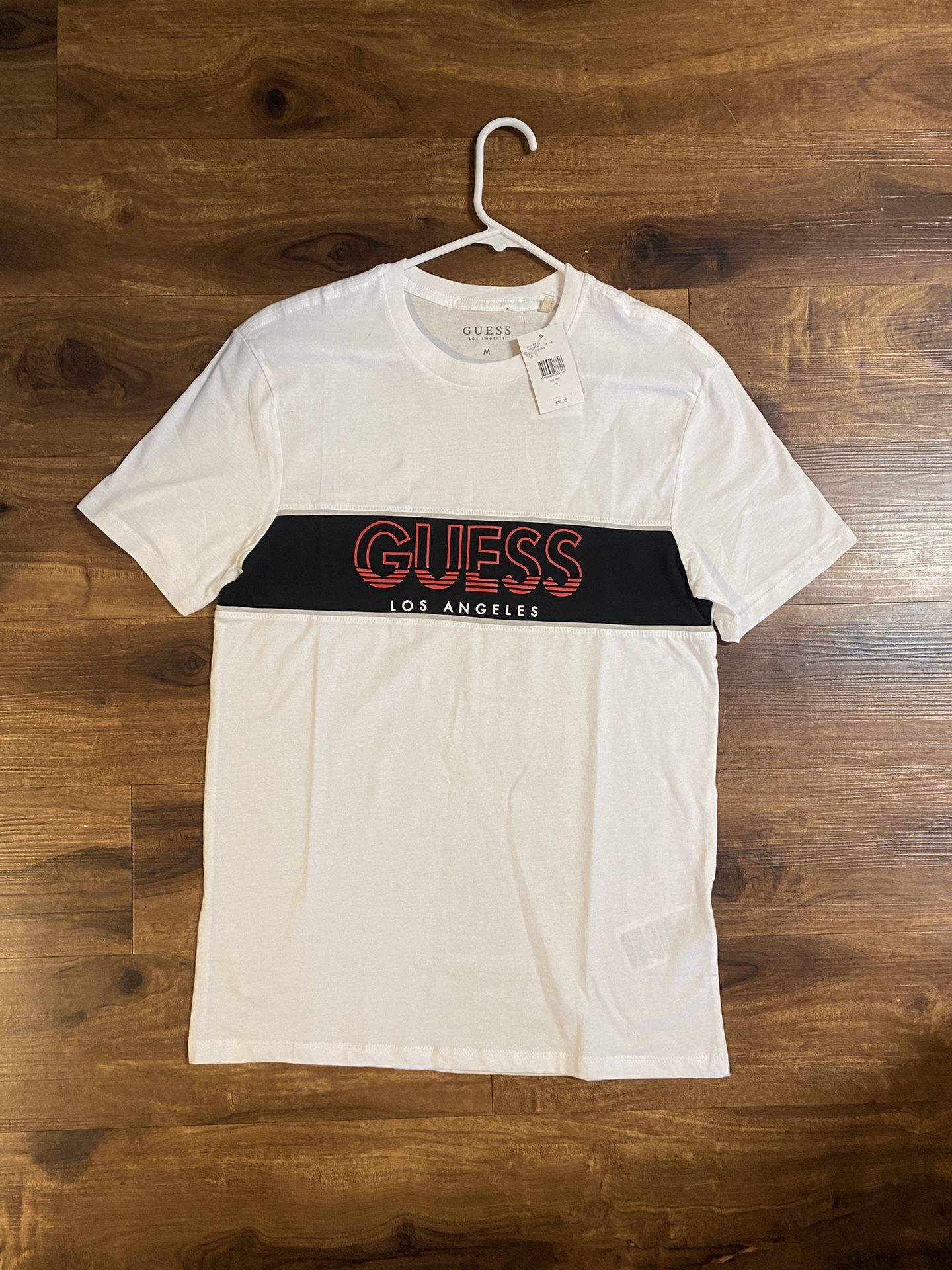 Brand new Men’s Guess brand white t-shirt up for sale 