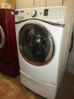 Whirlpool front load washer with pedestal working perfectly with 4 months warranty