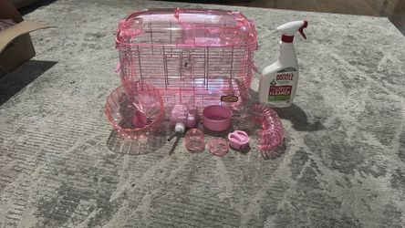 Pink mouse cage with act
