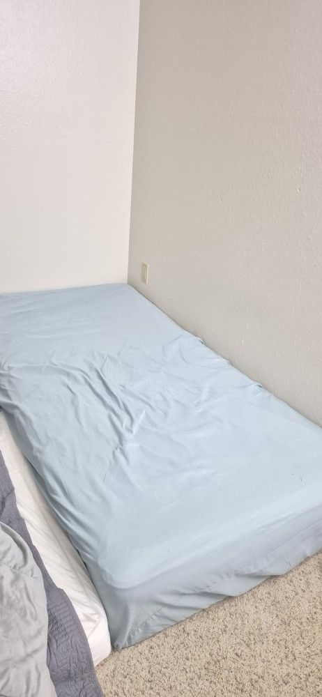 Thicker Twin Mattress with Light Blue Cover