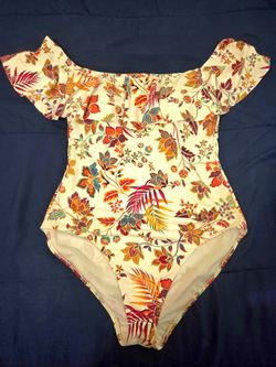 White flowerish swimming suit size 14