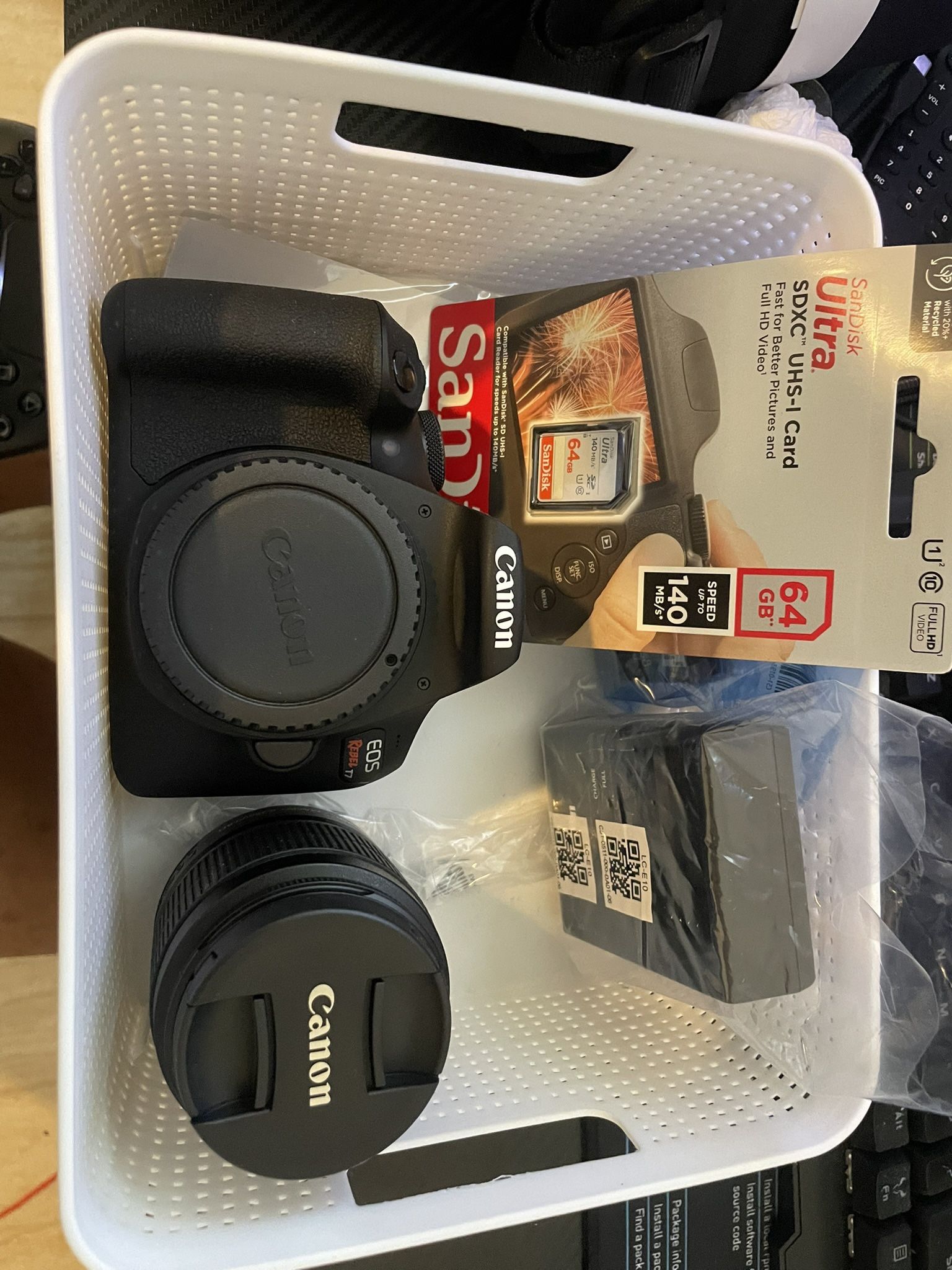 Canon EOS Rebel T7 DSLR Camera With 18-55mm Lens Starter Bundle + Includes: EOS Bag + Sandisk Ultra 64GB Card + Clean And Care Kit + More (Renewed)