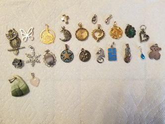 Various sterling silver pendants