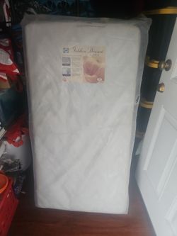 GOLDEN DREAM ULTRA SEALY MATTRESS.