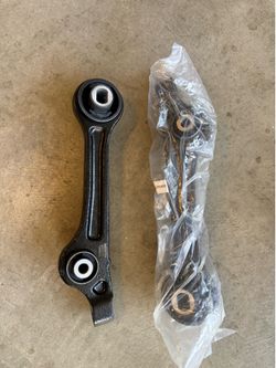 Front lower rearward control arms Moog for charger