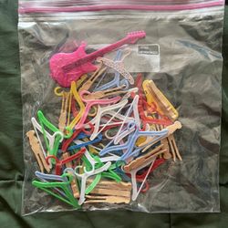 Barbie Doll Clothes Hangers and a Barbie Guitar. 