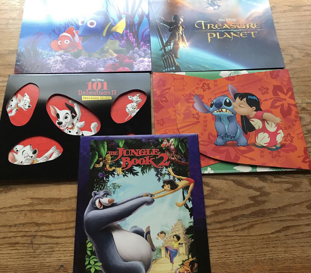 Disney’s Disney store lithographs Lilo and stitch finding Nemo treasure planet 101 dalmatians and jungle book 2