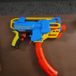 Nerf Rival Challenger MXXIV-1200 Motorized Blaster,

Curved 12 Round Magazine