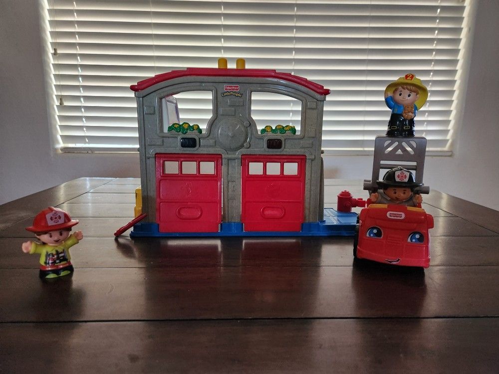 Vintage Fisher-Price Little People Fire Station playset with Firetruck and 3 Firemen