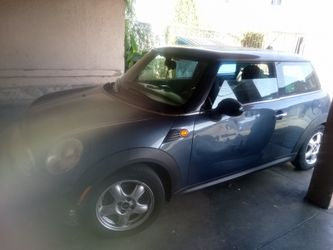 Mini Cooper azul con negro 2010 automático