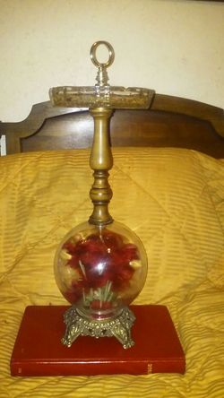 Vintage ashtray with glass bowl with flowers inside