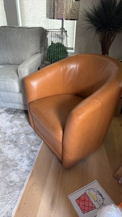 Brown swivel chair