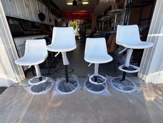 Brand new adjustable height swivel Bar stools only $100 each