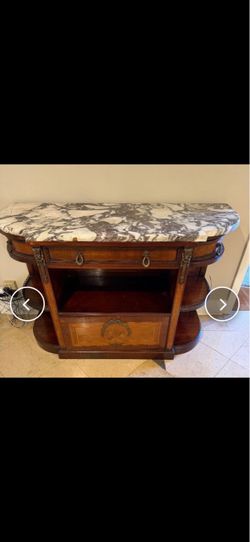 Elegant vintage-style wood console/server cabinet with a genuine marble top, featuring warm mahogany-toned wood, decorative brass/bronze-style mounts 