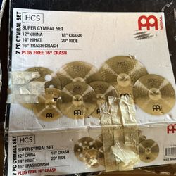 drum cymbals with snare drum and practice pad