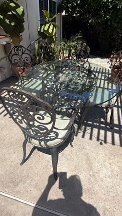 Glass Table w/ Four Heavy Duty Chairs