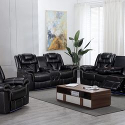 Power motion, LED lights and speaker on loveseat console. Sofa with LED lights and drop down tray and wireless charger, extra for delivery 