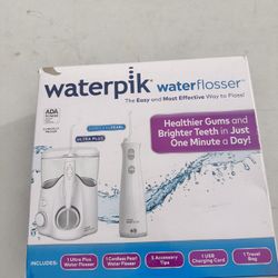 Waterpik Ultra Plus and Cordless Pearl Water Flosser Combo Pack