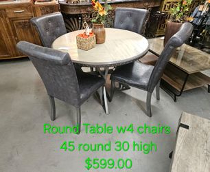 Round Dining Table Set with 4 Chairs We are located at 2811 East Bell road. Another Time Around Furniture.