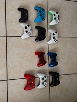 Lot of 11 Xbox and PlayStation Controllers