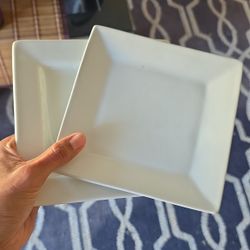 2 small square white plates