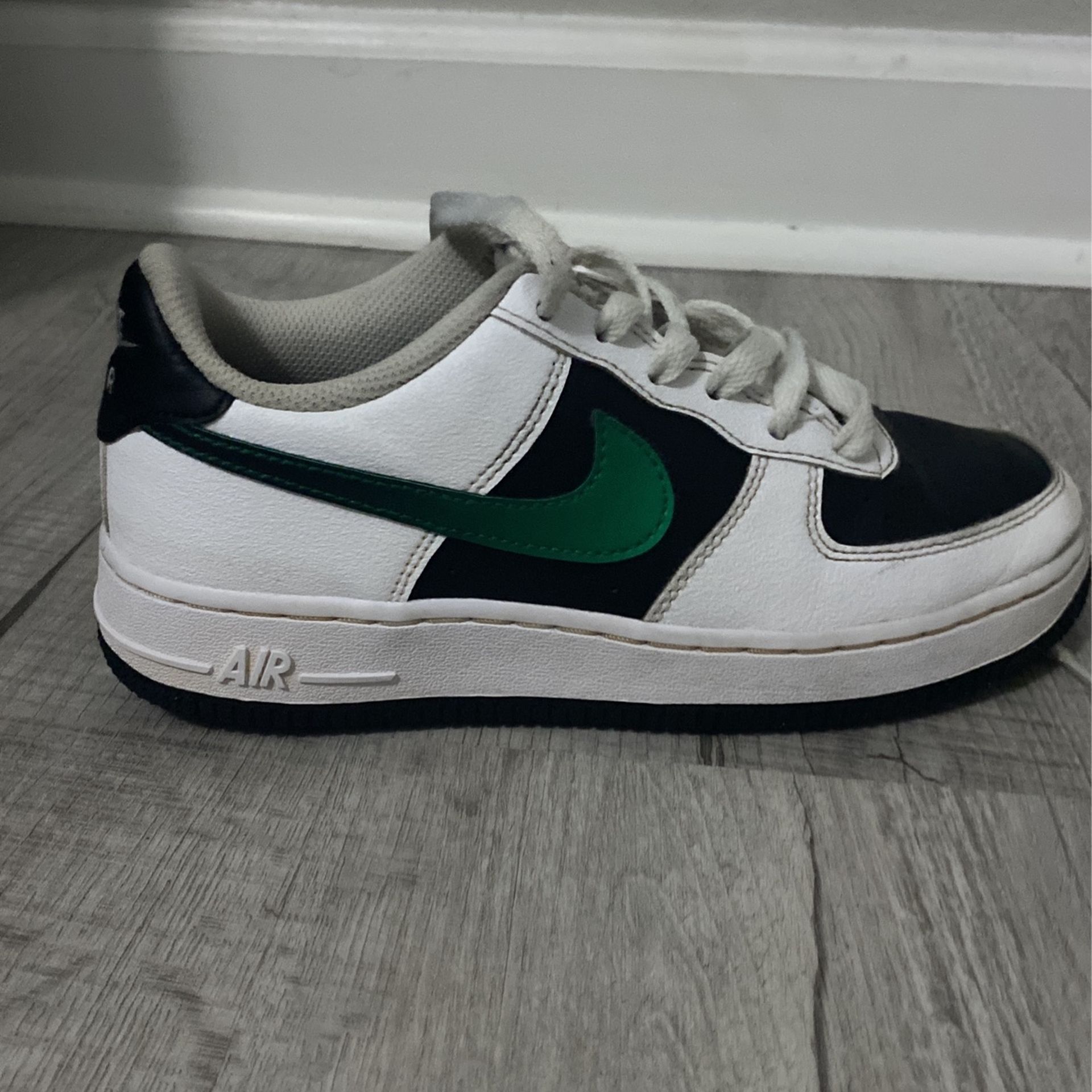 Green And Black Nike Shoe