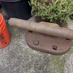 Antique metal mooring cleat or bollard.