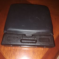 
Adjustable footrest with massaging beads for travel and office