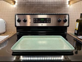 5 Assorted non stick oven trays/tins - all for $25
