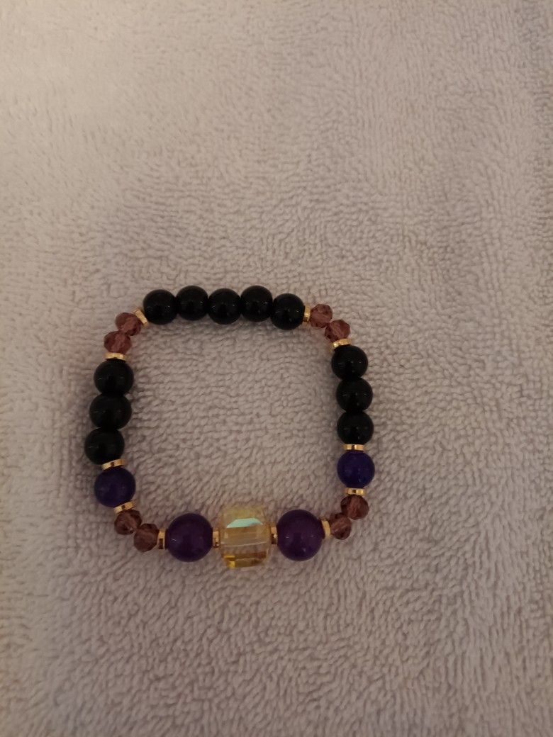Brand New Elastic Purple And Black Bracelet