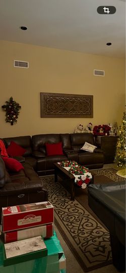 Brown leather sectional with recliners