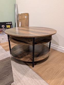 Coffee table with lift top
