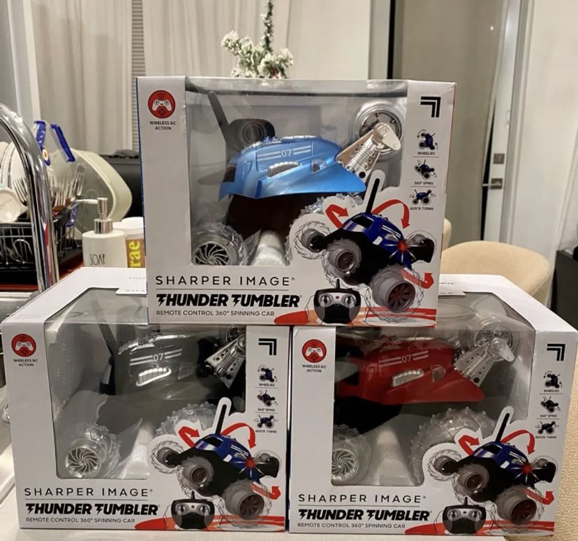 Sharper Image Thunder Tumbler Remote Control 360 Degree Rotating Car. red, blue and black Color