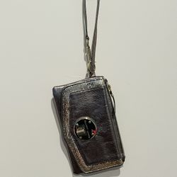 Designer Metallic Silver Leather Wristlet 