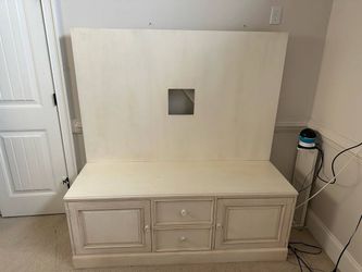Ethan Allen TV armoire. Used off white. Dimensions 21” x 60”