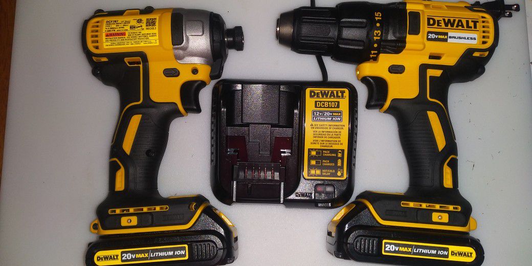 DeWalt Brushless 1/2"Cordless Drill And 1/4 Impact Wrench With 2. Volt. Max Batteries And Charger